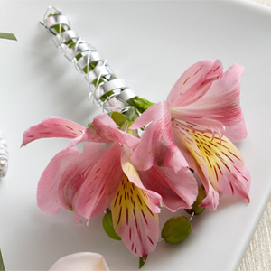 The FTD� Pink Peruvian Lily Boutonniere