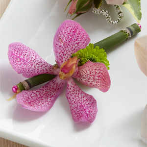 The FTD� Pink Mokara Boutonniere